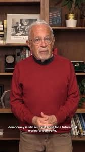 Cyberpunk Robert Reich in a nice sweater.